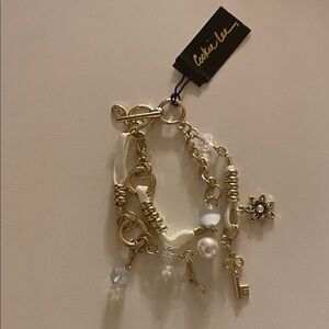 Cookie Lee bracelet with charms. Brand new with tag.